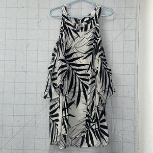 Black and white palm printed tank with sleeve cut outs.